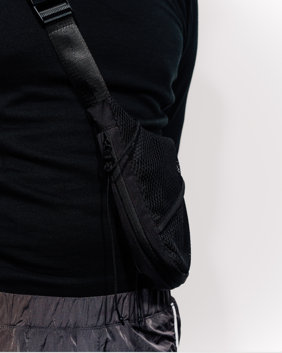 ARCS X Saul Nash Keyhole Sling Bag in Black